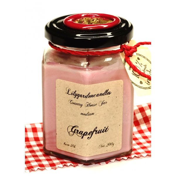 Scented candle grapefruit in a glass 200g